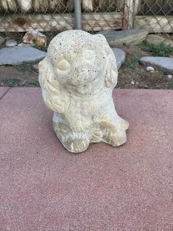 Cement dog garden statue