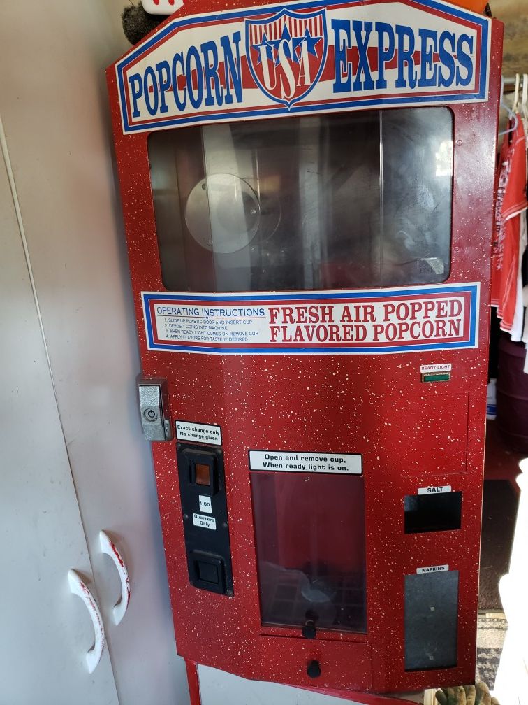 Coin operated popcorn vending machine
