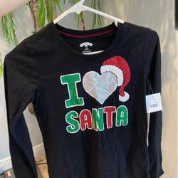 Brand New Christmas Shirt Yourh Size. 3 options sizes. Medium (7-8), L (10-12) & XL ( 12-14 )I L