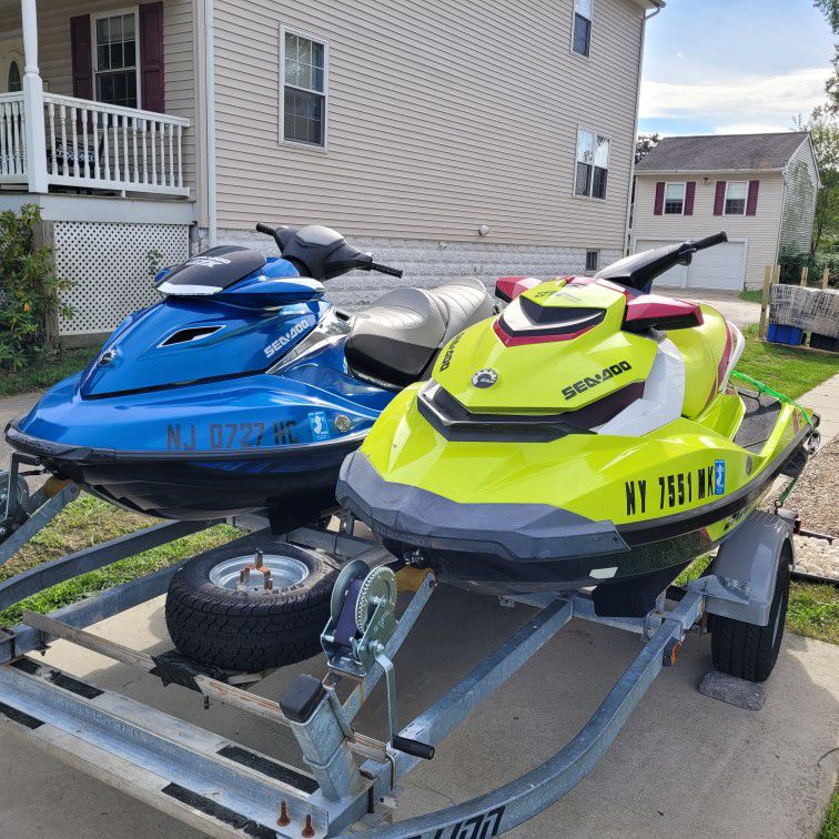 Two Seadoo Jet Skis With Trailer