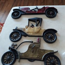 Three Antique Cars