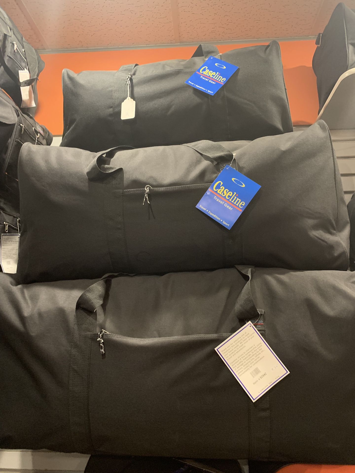 ** DUFFLE BAGS**