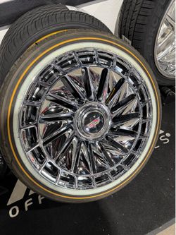 20s wheels chrome with Cadillac floating caps 5x120