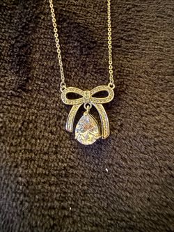 Gold Bow Pendant Necklace with Crystal Drop
