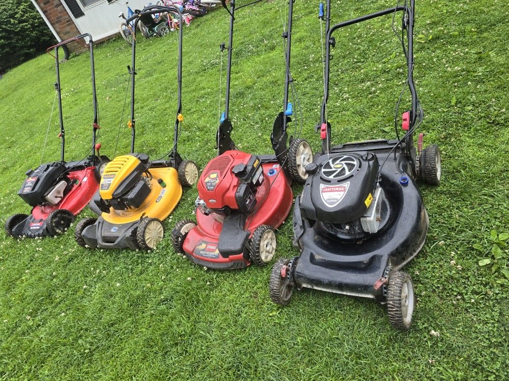 Lawn machinery for sale. Prices vary depending on the item.