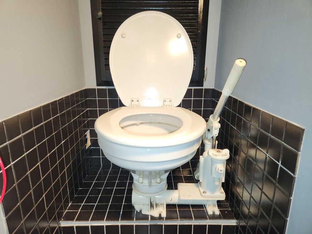 Raritan Toilet, manual in excellent condition.