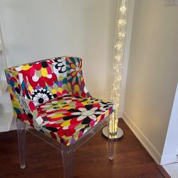 Vintage upholstered chair in modern acrylic