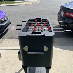 Fooseball table with cooler and wheels 