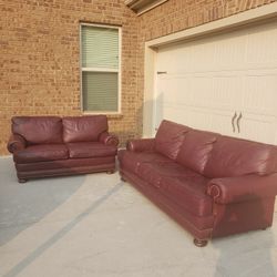 THOMASVILLE BURGUNDY LEATHER SOFA AND LOVESEAT 