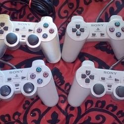4 PlayStation 2 Controllers 