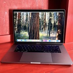 Apple MacBook Pro 15” Retina Touch Bar, I7, 16GB RAM 256GB SSD macOS 15.1 Sequoia $500