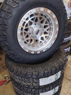 17x9 XM rims 6 lug 6x139 on new tires 265 70 17