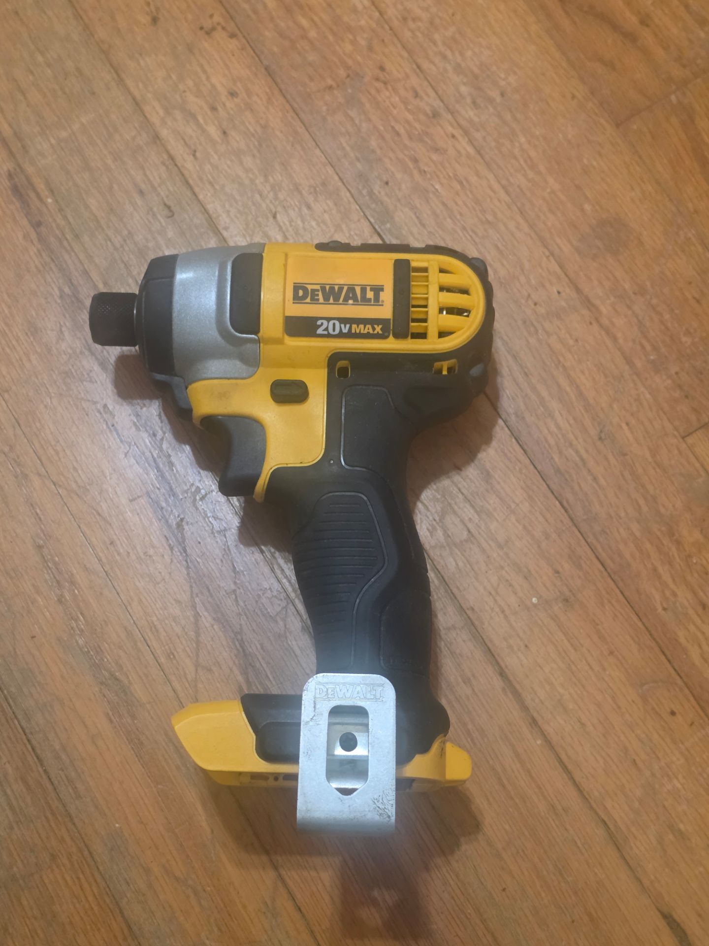 This is a DEWALT 20V MAX 1/4-inch Impact Driver (Model DCF885)