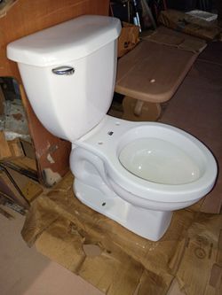 White Two-Piece Toilet with Chrome Handle