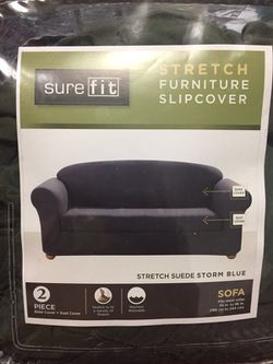 Two Sofa Slip Covers