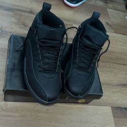 Winter triple Black Jordan 12s