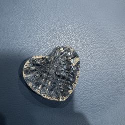 Elegant crystal heart-shaped paperweight.
