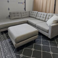 L-shaped sectional sofa with ottoman