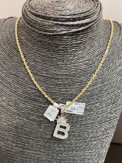 10k gold SOLID rope chain and real diamond pendant combo for a good price!