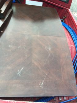 Table and four chairs with leaf extension