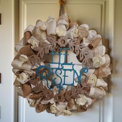 Handmade floral wreath with He Is Risen Sign