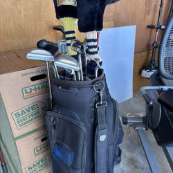 Three Sets Of Golf Clubs 
