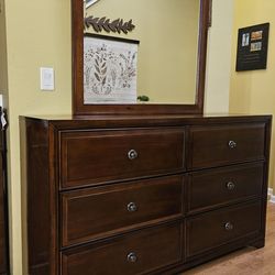 Clean and Nice Brown 6 Drawer Dresser and Mirror.
