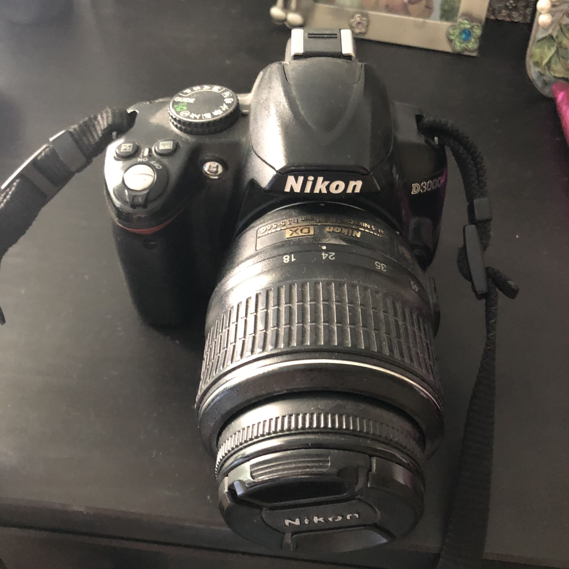 Nikon D3000 camera with lens