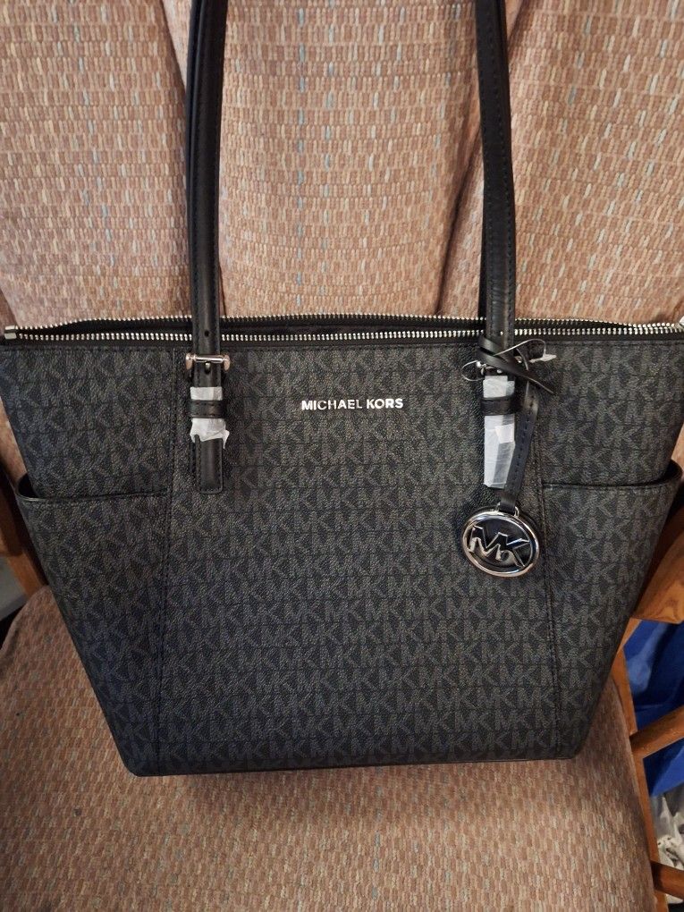 Micheal Kohrs Purse