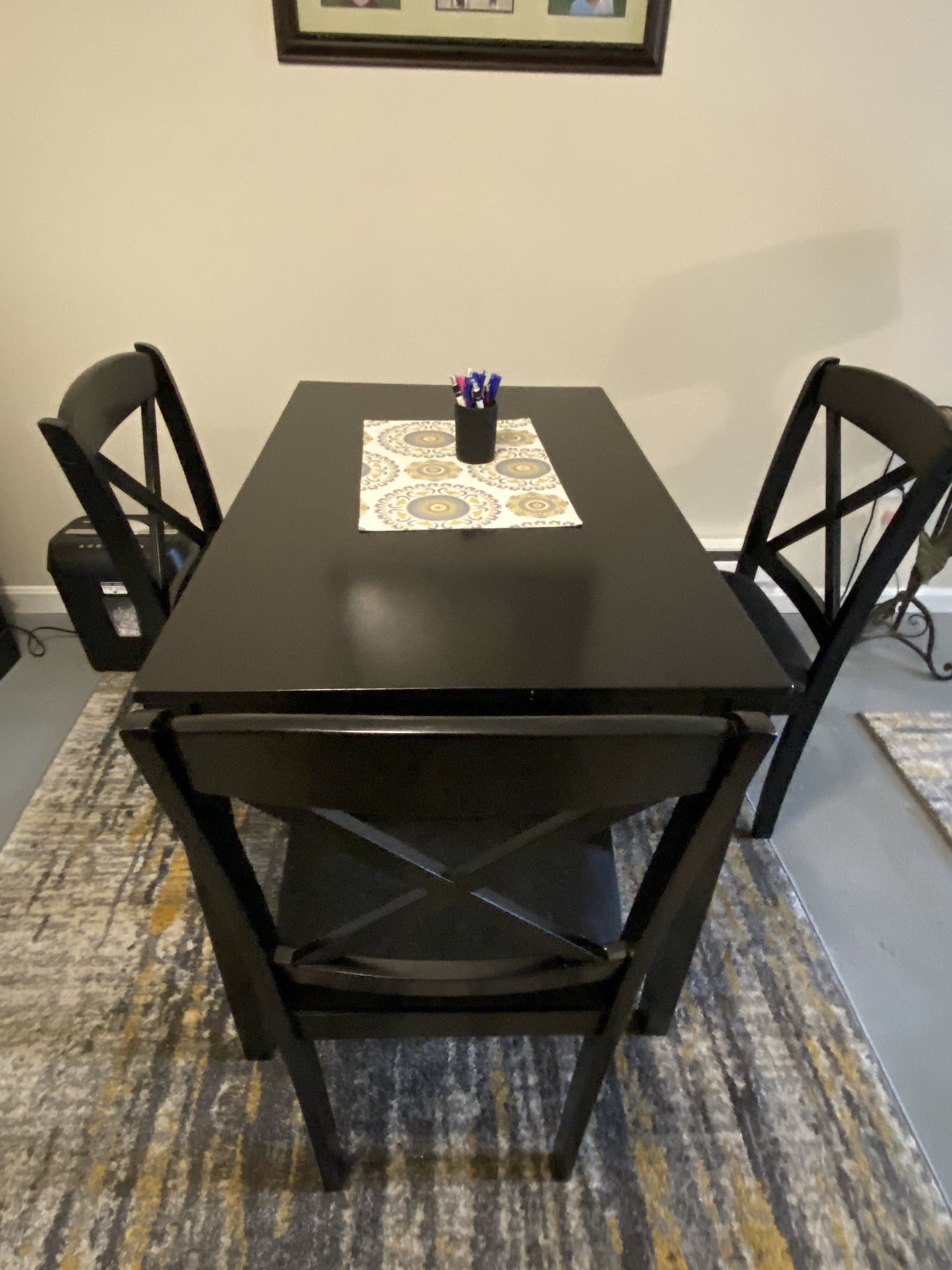 Table And Three Chairs