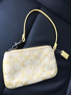 Yellow coach wristlet