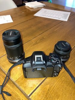 Canon R50 camera with RF18-45mm lens and RF70-210mm lens