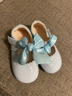 Three Pairs Of Girl Shoes