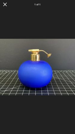 Vintage soft blue glass perfume bottle spritzer