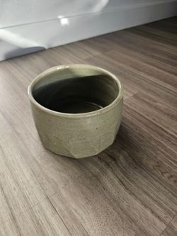 Olive colored small vase