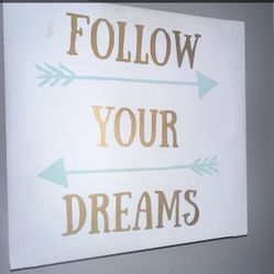 "follow your dreams" wall picture