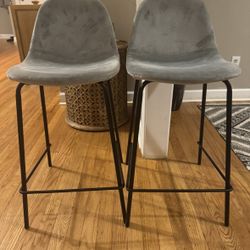 Counter height bar stools, gray velvet and black metal