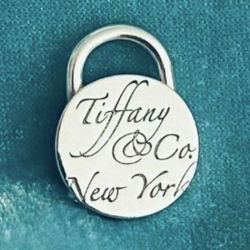 Tiffany & Co. Circle Notes Padlock Charm