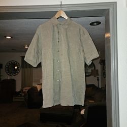 Tan and cream striped Van Heusen short sleeve button-up shirt.