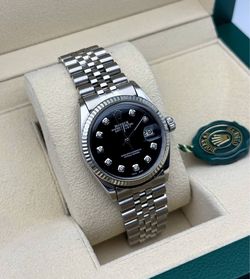 1978 Rolex Datejust 1601 36mm stainless steel jubilee bracelet natural diamond black dial white gold fluted bezel watch box appraisal