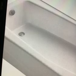 Standard Size Bathtub Left Side Drain With Attachment For Easy Installation Asking $177. Obo 