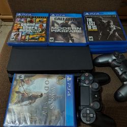 PS4 Slim with 2 controllers + 9 games