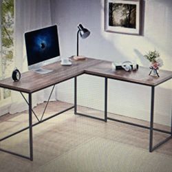 L shaped computer desk. Metal and wood corner desk. Oak top with black metal. 59/55”W x 19.7”D x 29.9” H. Brand new in box.