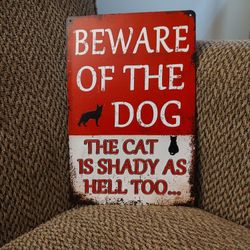 METAL SIGN.  12" X 8". NEW.  PICKUP ONLY 
