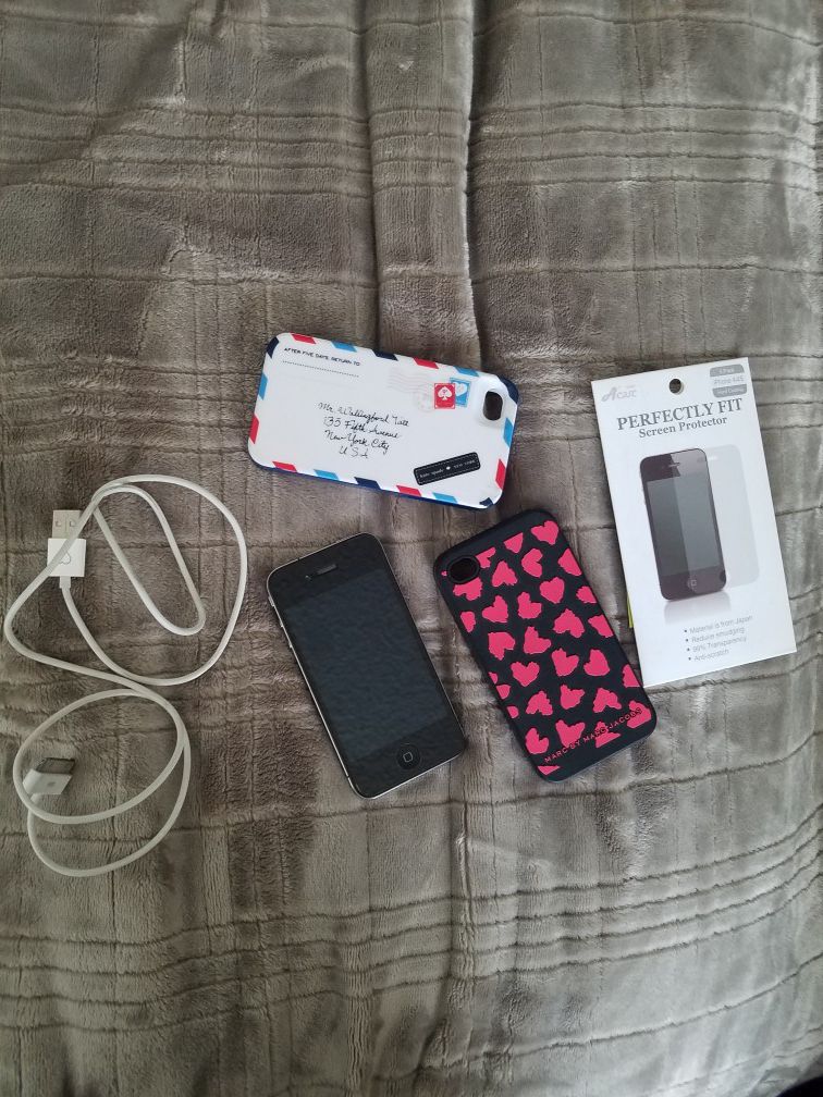 Iphone 4 with 2 cases, extra tempered glass and charger cable