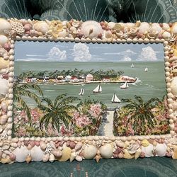 Vintage tropical beach painting with a seashell frame