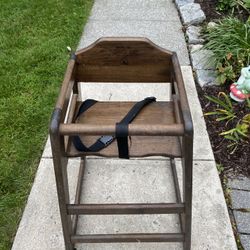 Wooden High Chair wood 29” high at back by 20” wide at base 