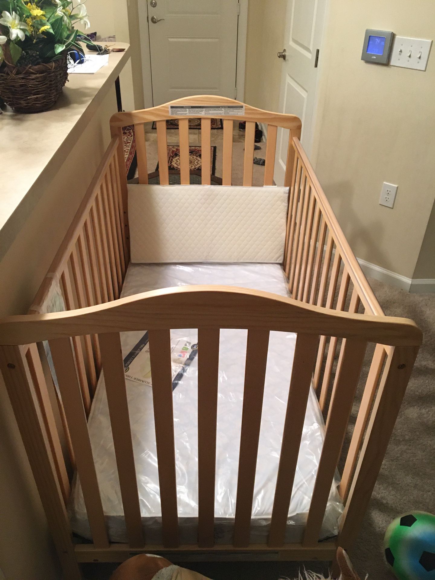 New Convertible Baby Crib + New Mattress still in cover + New Pillow
