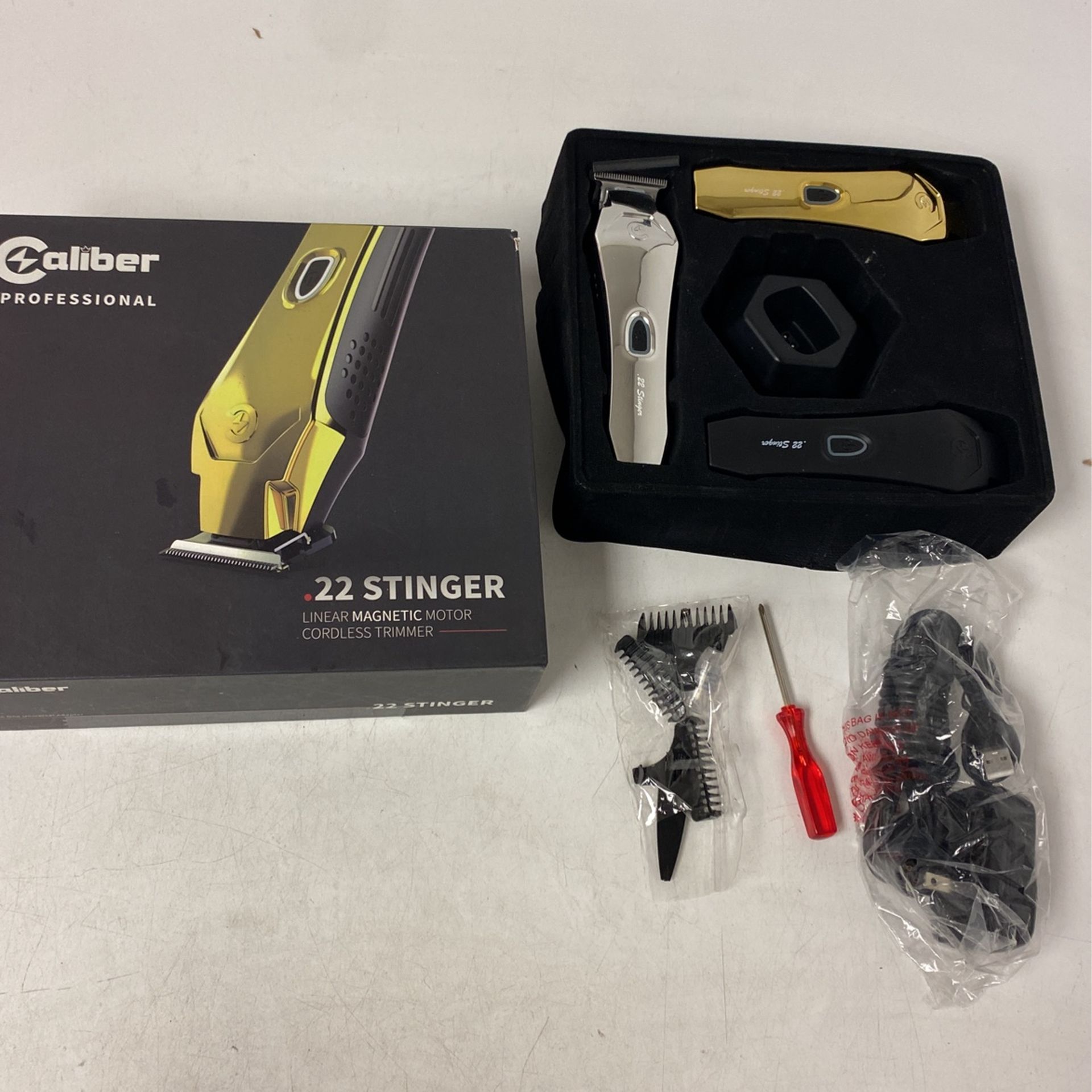 Caliber .22 Stinger Linear Magnetic Motor Cordless Trimmer, open box