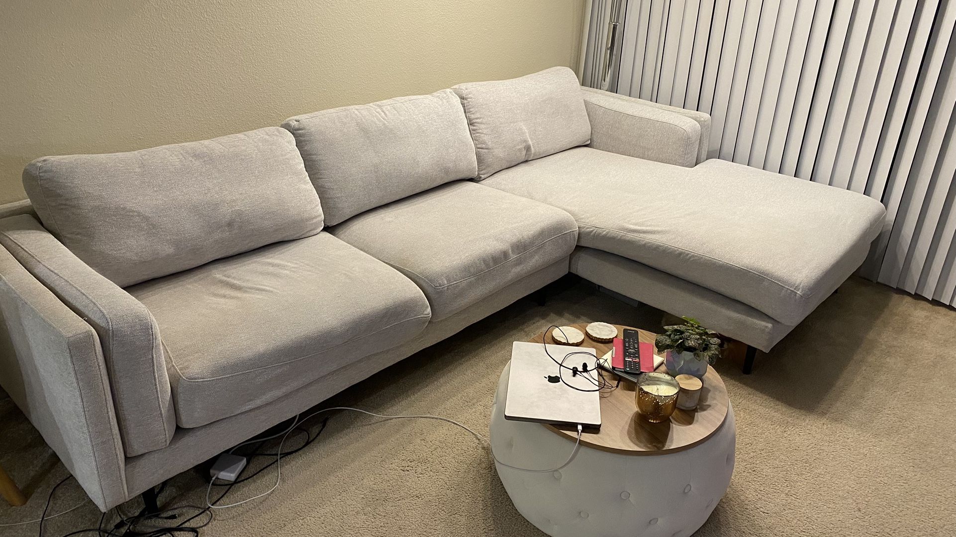 Couch. Living Spaces AQUARIUS II LIGHT GREY SECTIONAL. 120 X 70